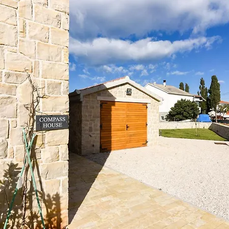 Compass House